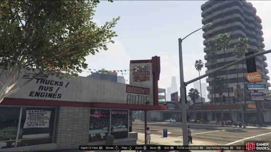 to find the monkey mosaic sitting on the Woody&rsquo;s Autos sign.
