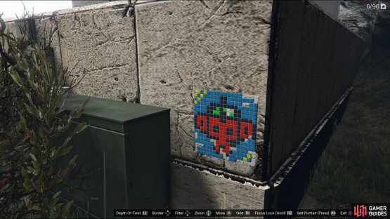 to find the monkey mosaic sitting on the base of a billboard.