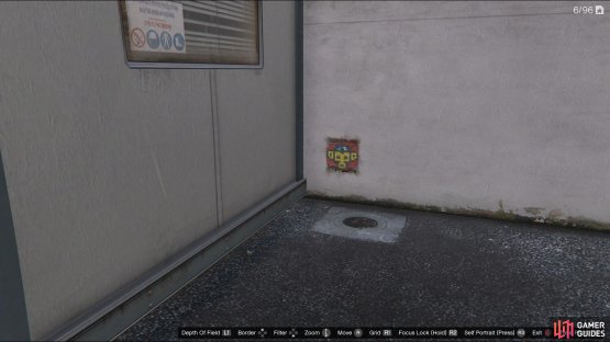 to find the monkey mosaic sitting next to a  Portacabin .