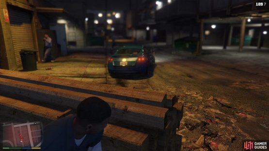 Wait for the blue car to drive off
