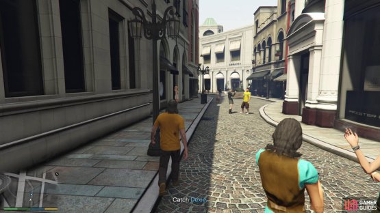 Find Kerry walking down an alley 