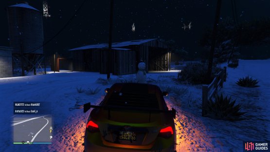 to find the Snowman standing near a shed.
