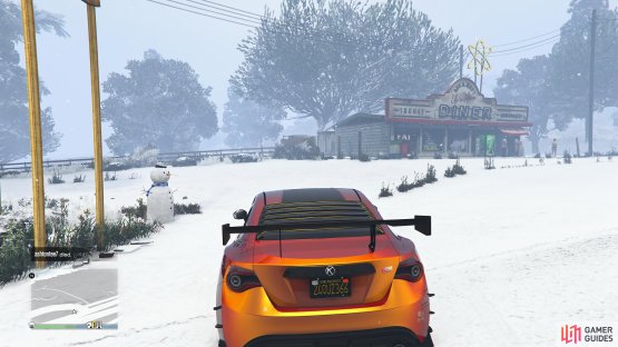 to find the Snowman standing left of the diner.