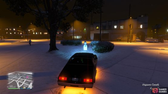 to find the Snowman standing near a tree.