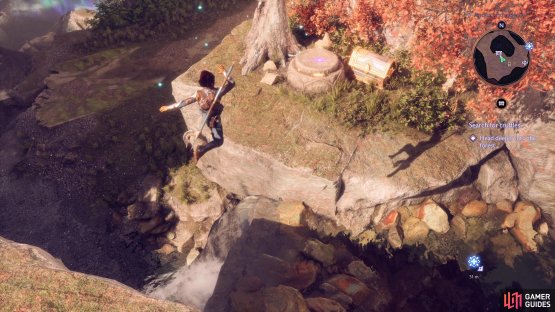 Follow the path around to circle back to the chest from above and leap over to reach it.