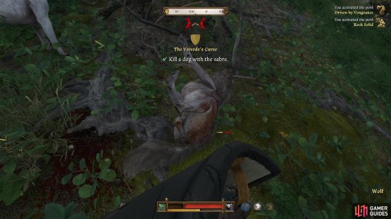 You only need to kill one dog to fulfill the objective.