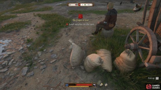 Grab the sacks next to him and throw them on the back of the wagon next to them.