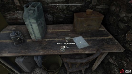 Enter the garage and loot the Key from the table on your right.