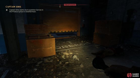 Go left once you&rsquo;re in the first hallway to find a shutter you can crawl under.