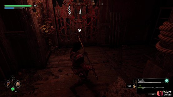 Go down the stairs and through the gap to find this locked door requiring the Key of the Lord.