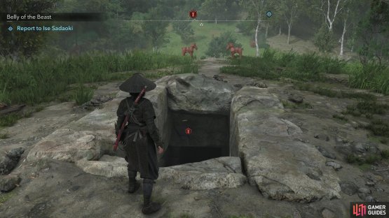 Find the exposed entrance to the tomb atop a hill,