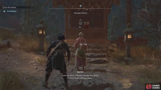 She will be standing right in front of the shrine, so speak to her to finish the quest.