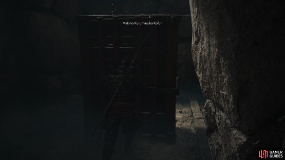 You can move the wooden boxes here to get behind them.