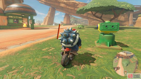 In the safari, drive toward the large slanted rock.