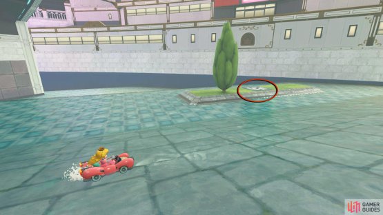 Drive across the shallow water to the small patch of grass where a lone tree is. The panel will be next to it.