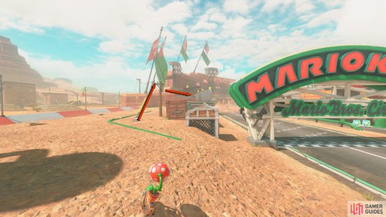 To the right of the starting flag is a telephone wire you can drive on. Use this to reach the mountain.