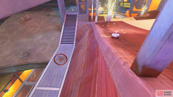 Follow the track until you drop and then drop onto the walkway to your left.
