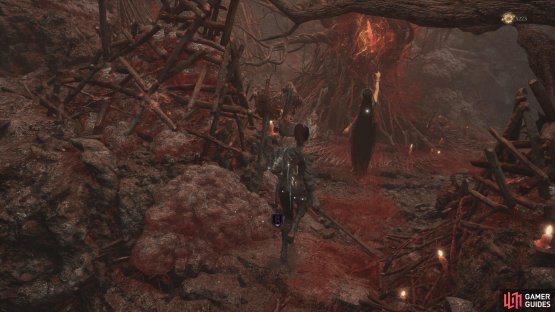 On the other side is the Red-Clad Lady, next to the burning pyre.