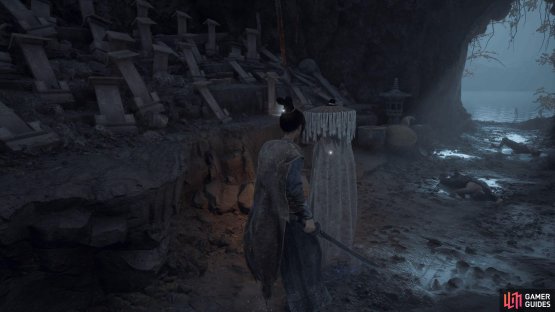 The Warrioress will be at the back of the tunnel to the left of the Bai Mansion shrine.