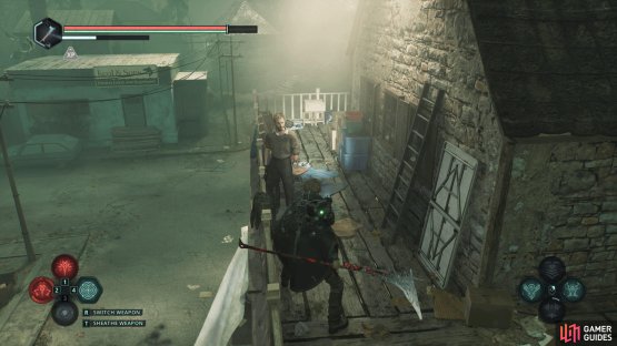 Speak to Talis and defeat the enemies outside the church to get the Statue Key.