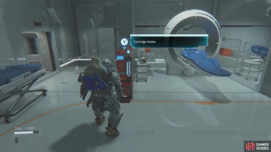 In the one room right next to the same checkpoint will be a Cartridge Holder.