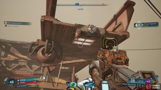 At the gas station, use the grapple in the front to get onto the roof.