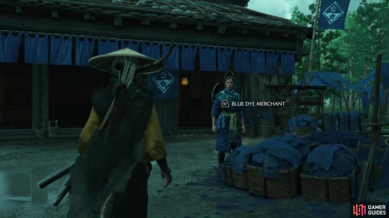 the merchant can be found outside, tending her textiles.
