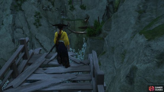 following the Torii gates will lead you to a ruined wooden bridge, and the start of the platforming segment.