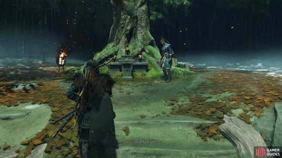 Note the fox statues near the tree,