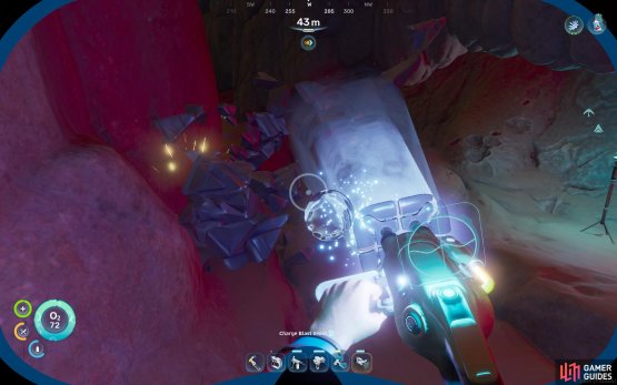 Charge it up, then get close to break the node and retrieve your materials.