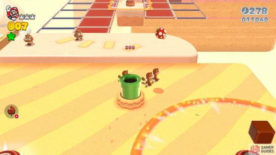 Head down this pipe to do a little minigame for the second Green Star