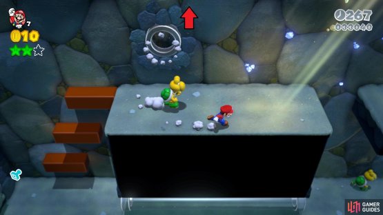 Climb the wall here to find the secret exit to World 2