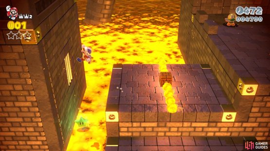 The first Green Star is pretty close to the lava, but slide down the wall to get it