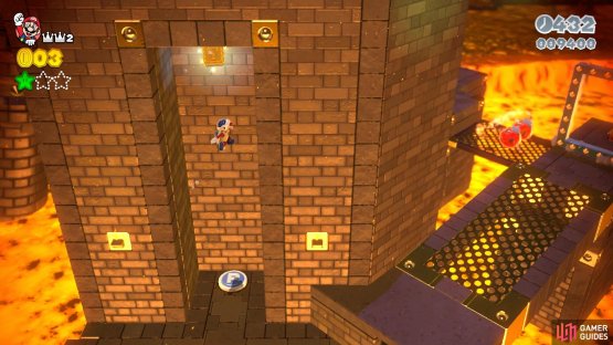 Blow up the grey bricks and wall jump above the P-Switch to find the Stamp
