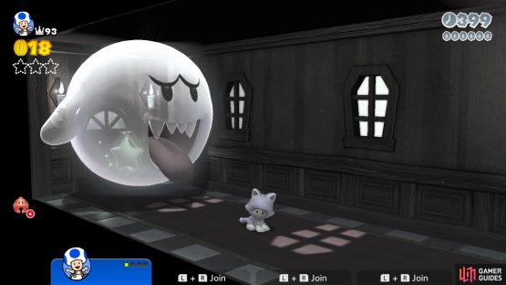 The first Green Star is behind the Big Boo at the beginning