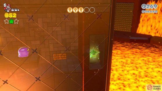 Bust through the bricks at the base of the wall to find the third Green Star