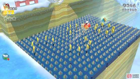 Use the Ice Skate to cross the spikes and grab the Stamp