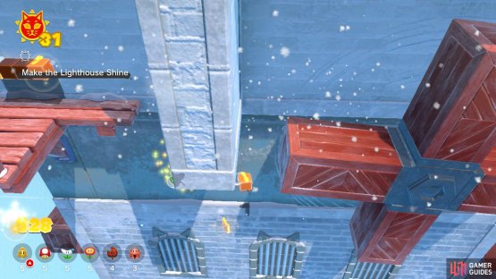 Drop down under this wall, then fly to the spinning platforms