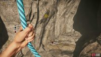 use the grapple point to descend to a cave in the middle of the waterfall