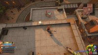 Run up the building opposite the Theater to spot this Lucky Emblem