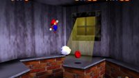 In the middle of the room with one of the Boos is the fourth coin