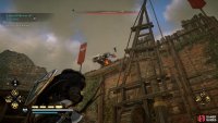 You should destroy the springald before you attempt to destroy the blockade.
