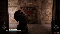 Use the fire pot to destroy the breakable wall.
