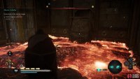 Once inside the building, use the Power of Muspelheim to step into the lava unharmed while you pull the boulder back.