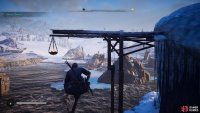 Jump from the tip of the highest spar to the wooden platform to the east.