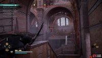 Take out the guards on the wooden platforms to avoid being spotted as you approach the guard who holds the key.