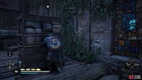 Move the barricade beneath the ladder to climb on it.