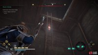 Once inside the building, shoot the ladder down to climb it.