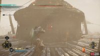 Destroy the blockade on the other side of the window, then shoot the lock to the door.