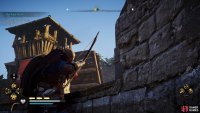 Shoot the right link of the drawbridge.